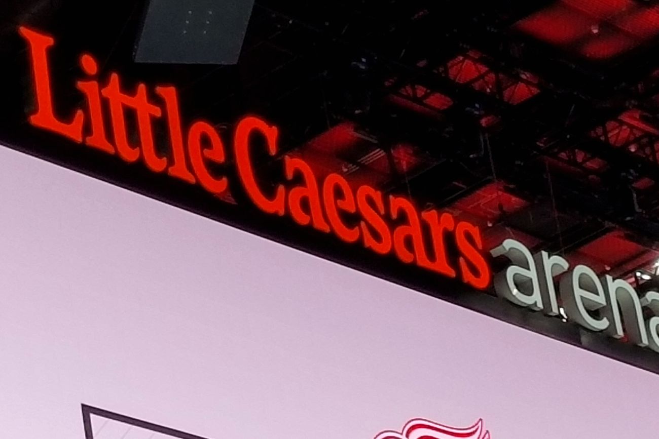 Signage inside Little Caesars Arena