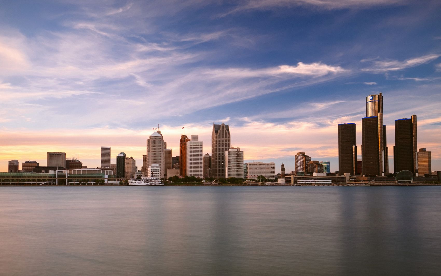 The Detroit skyline at dusk, seen across the river